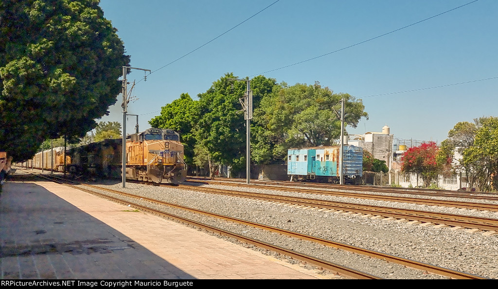 UP & CSX Locomotives leading a train